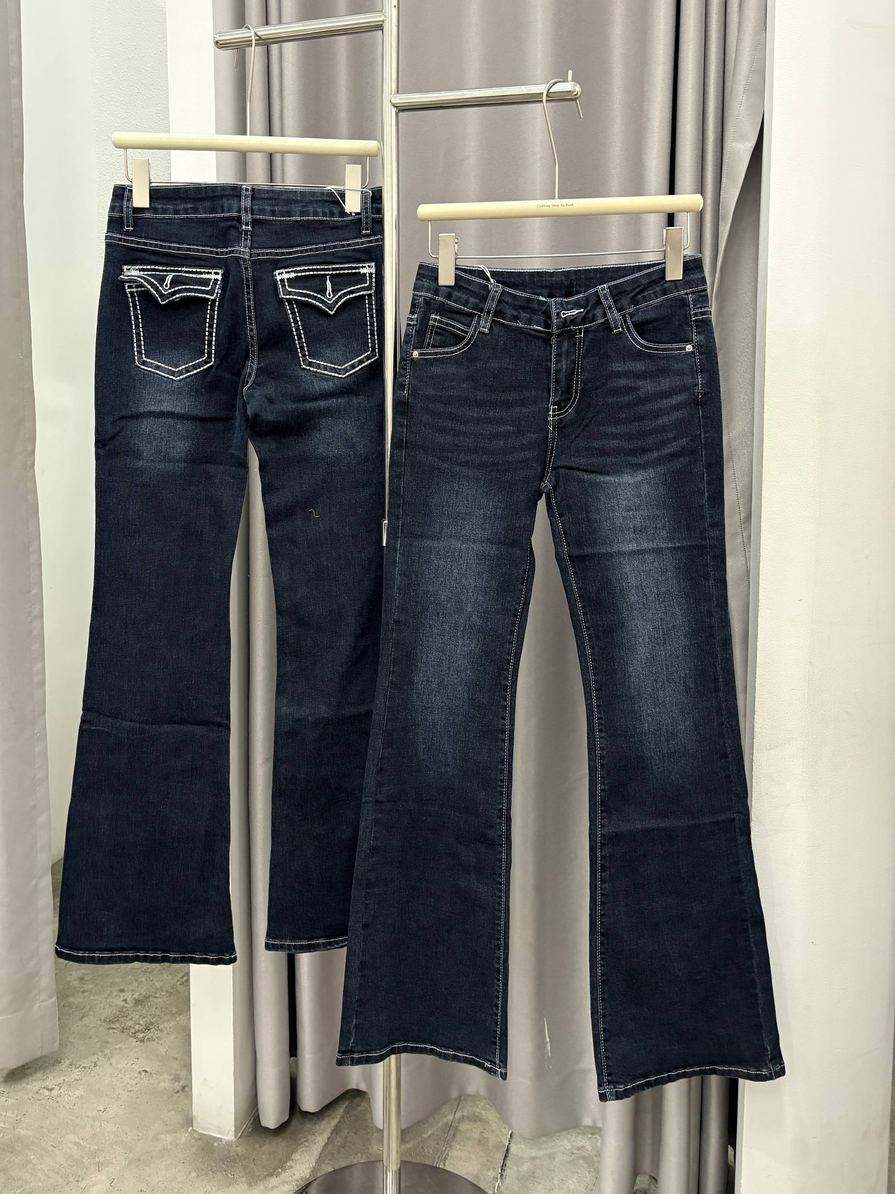 Contrast-stitched flap-pocket flare jeans