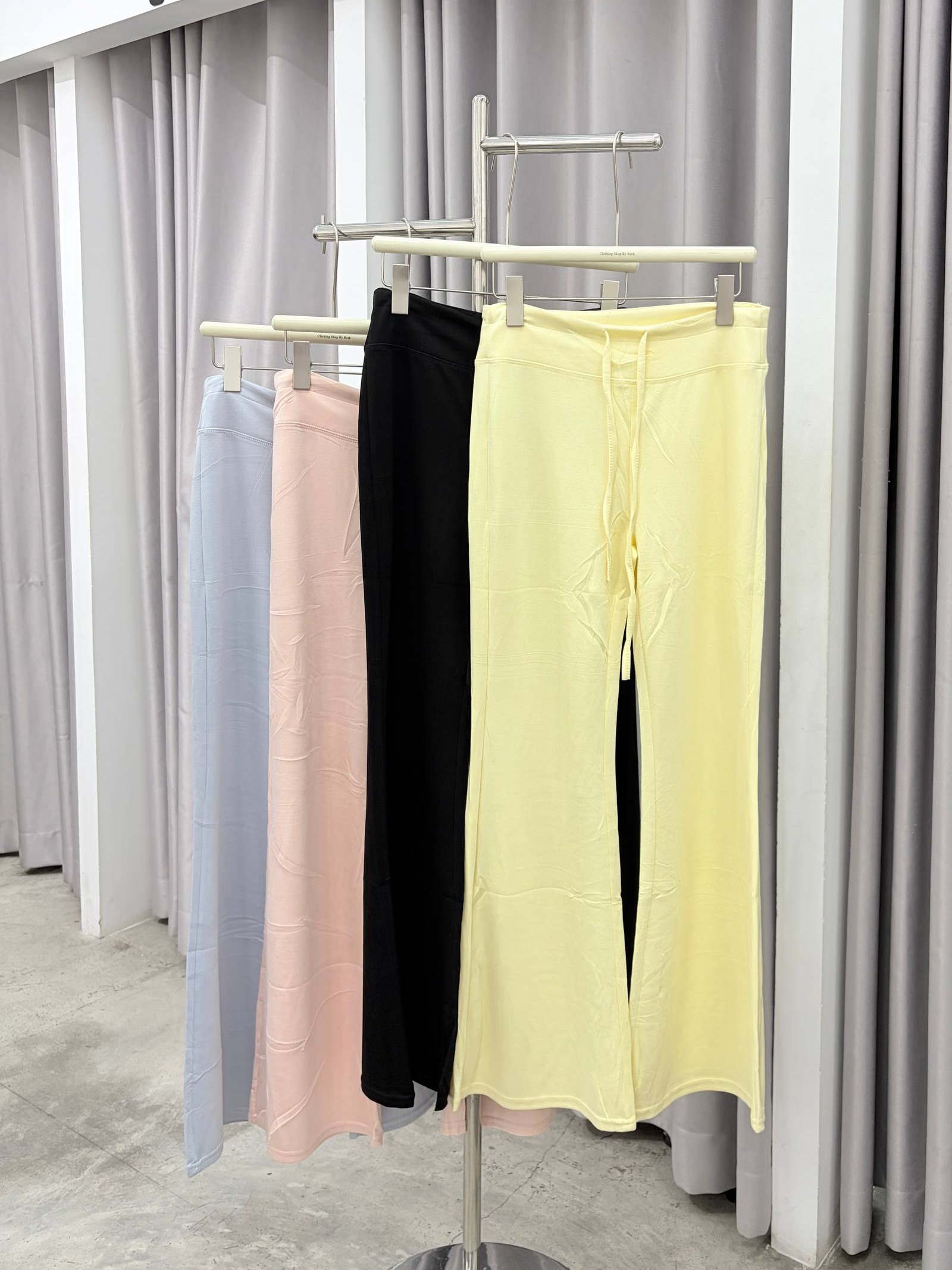 Low-rise lace-up flare pants