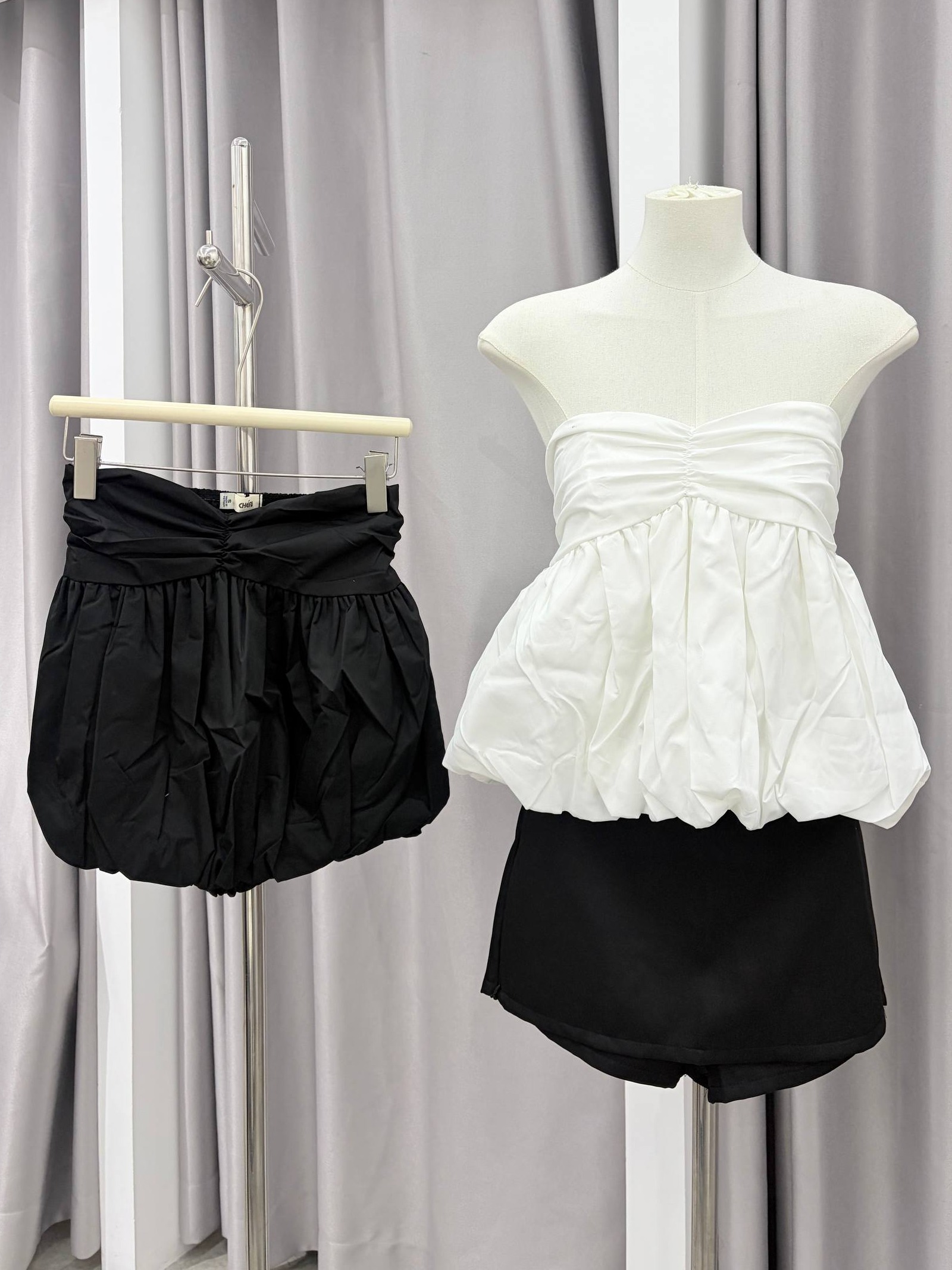 Strapless ruched bubble-hem tube top
