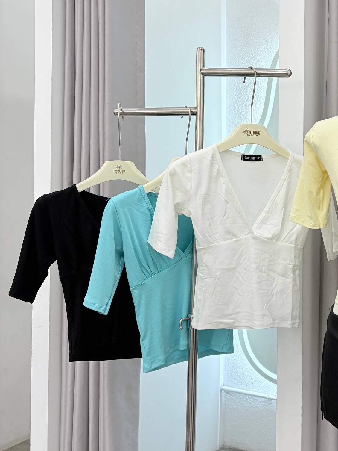 Deep V-neck elbow-sleeve top
