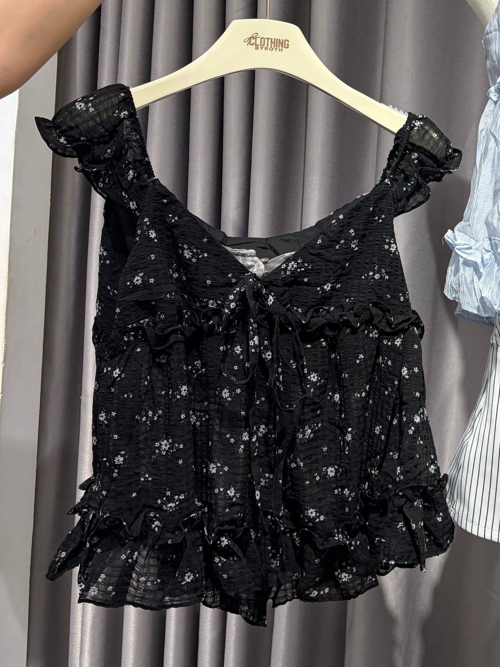 Ruffled babydoll camisole top