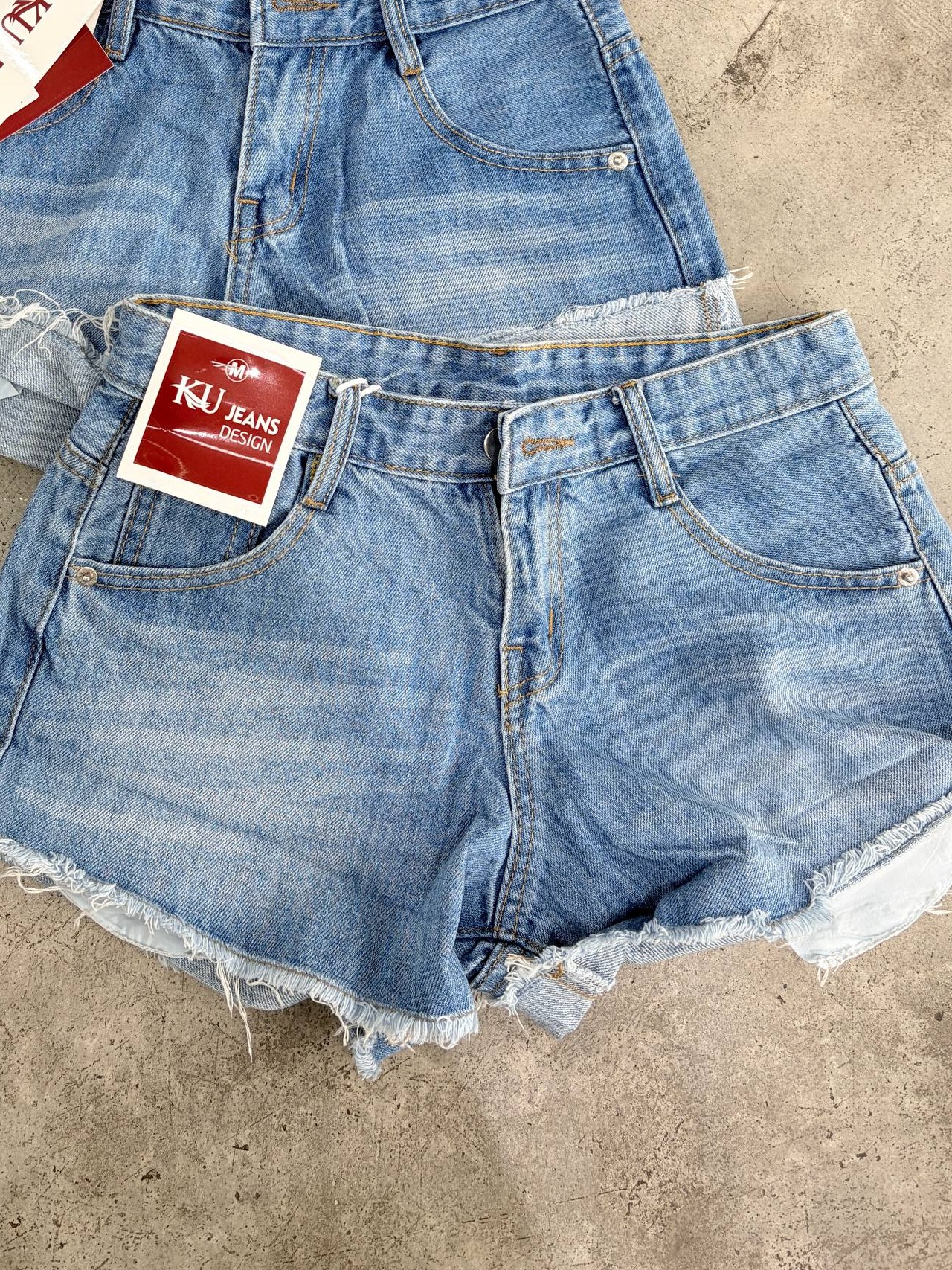 High-waisted raw-hem denim shorts