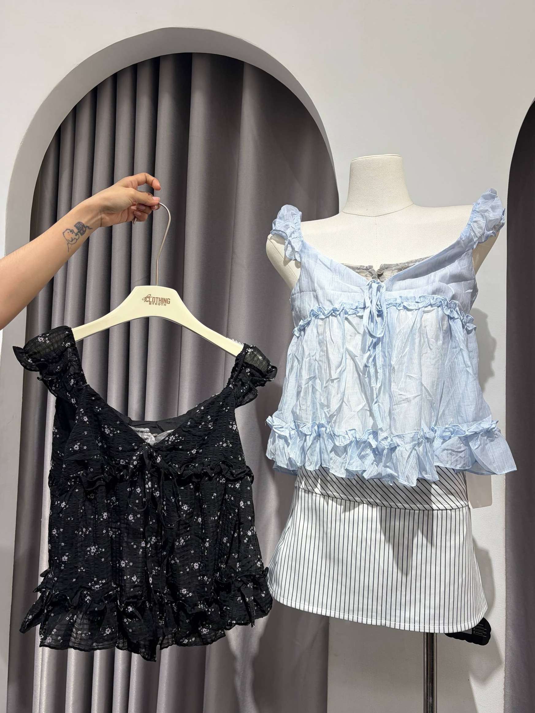 Ruffled babydoll camisole top