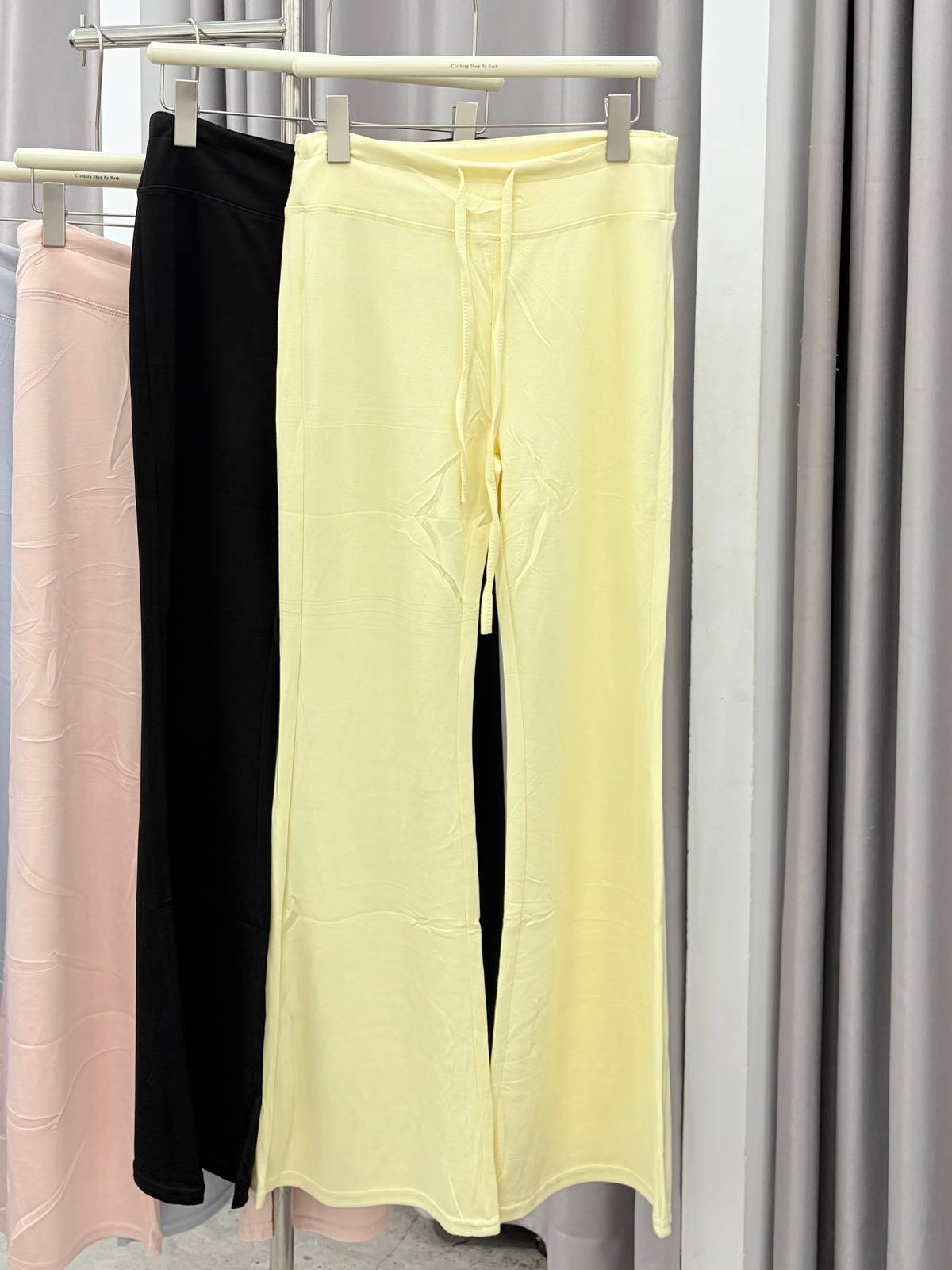 Low-rise lace-up flare pants