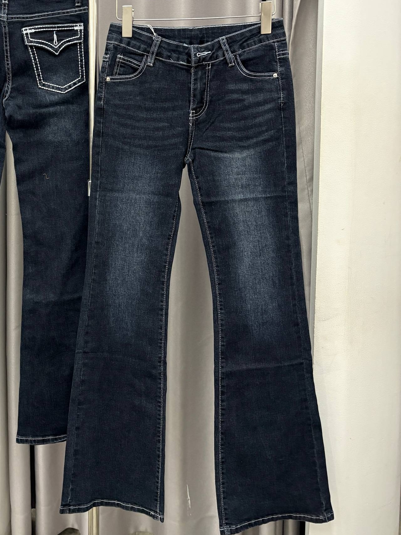 Contrast-stitched flap-pocket flare jeans
