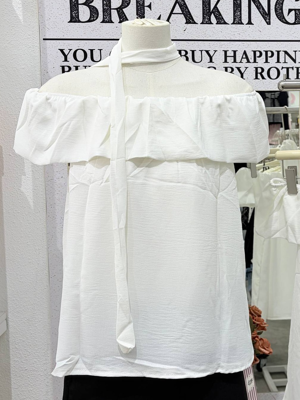 Ruffled off-the-shoulder neck-tie top