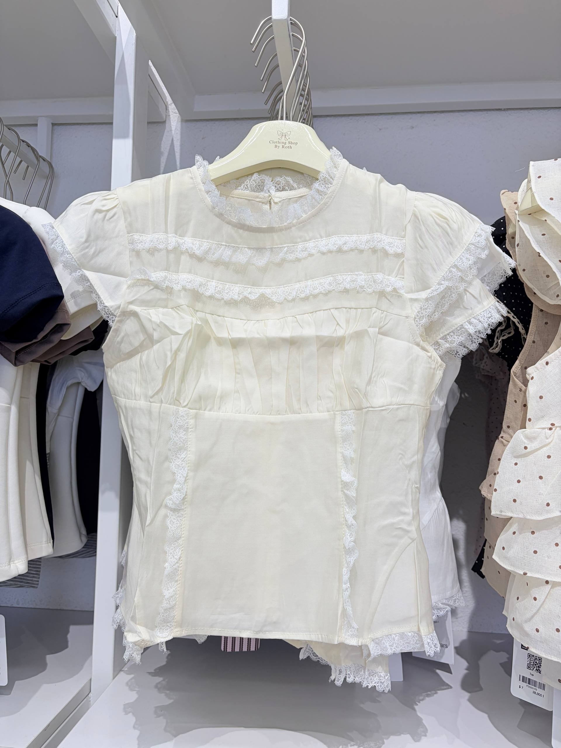 Victorian lace-paneled cap-sleeve blouse