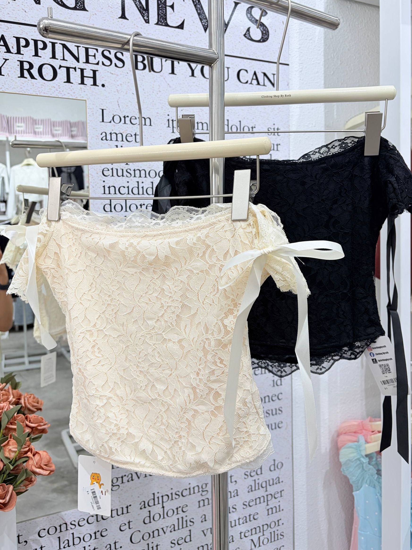 Off-the-shoulder lace top with ribbon ties