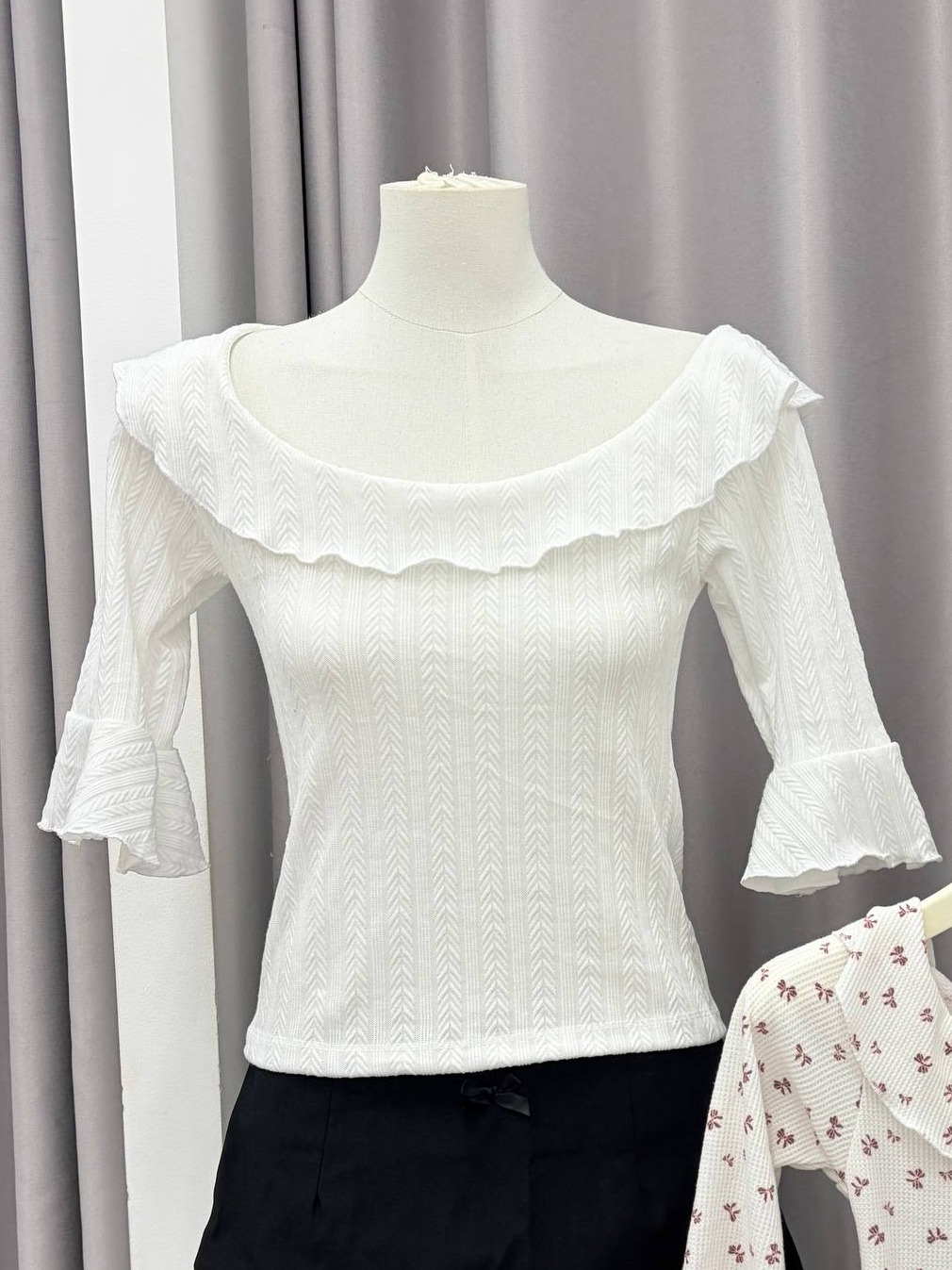 Ruffled scoop-neck bell-sleeve top