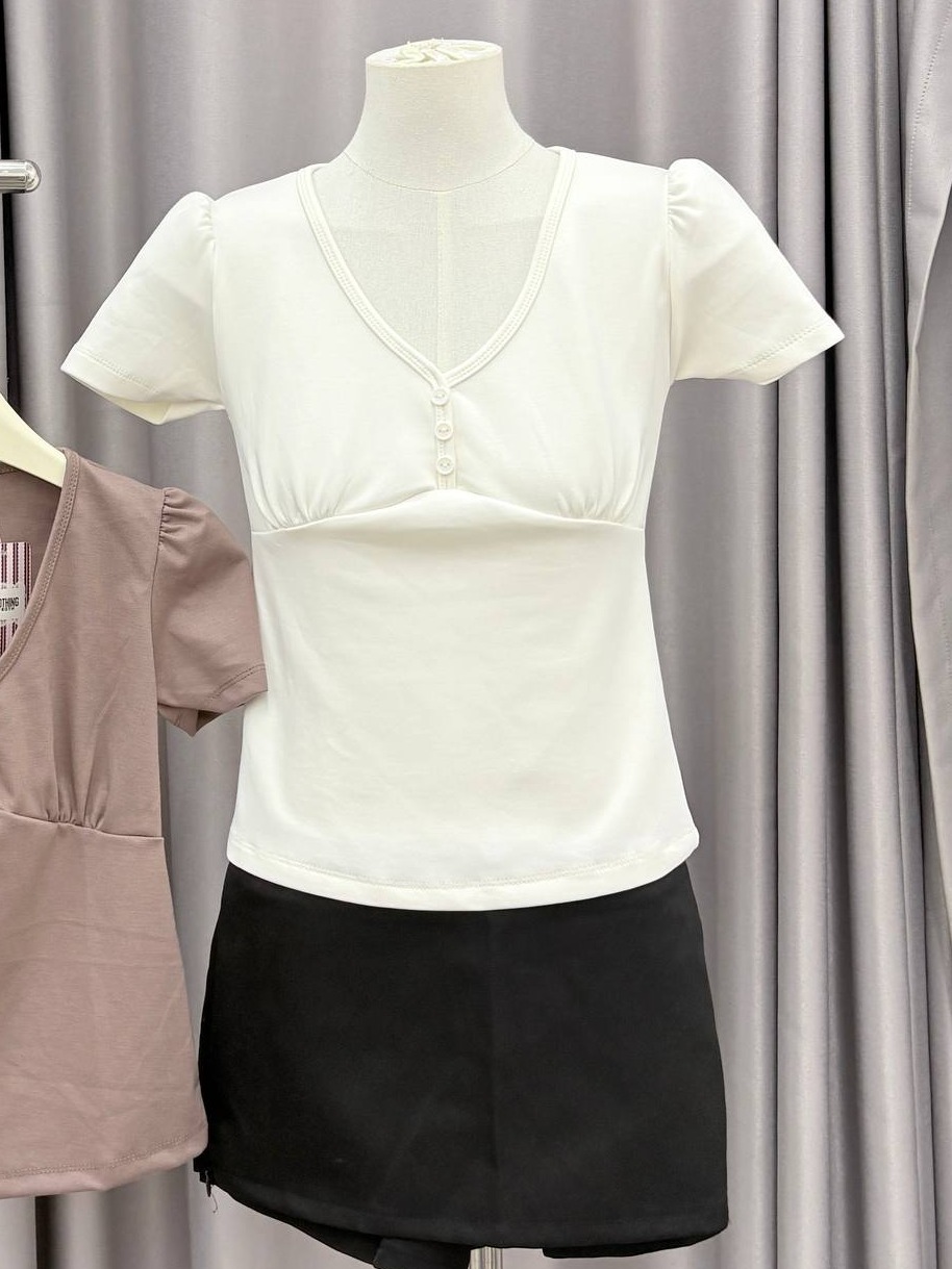 Puff-sleeve button-front empire waist top