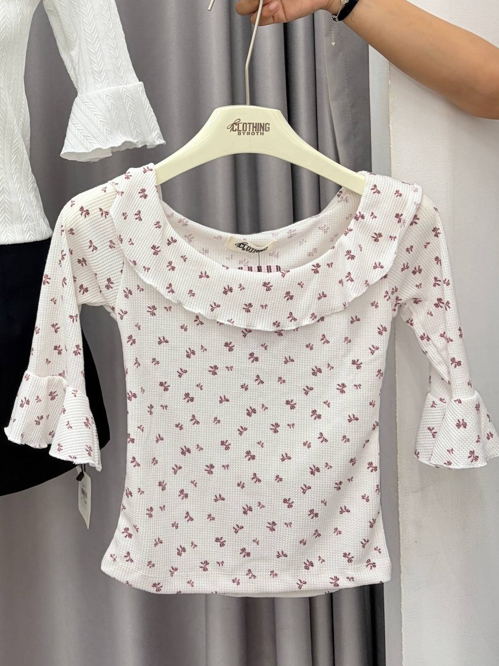 Ruffled scoop-neck bell-sleeve top