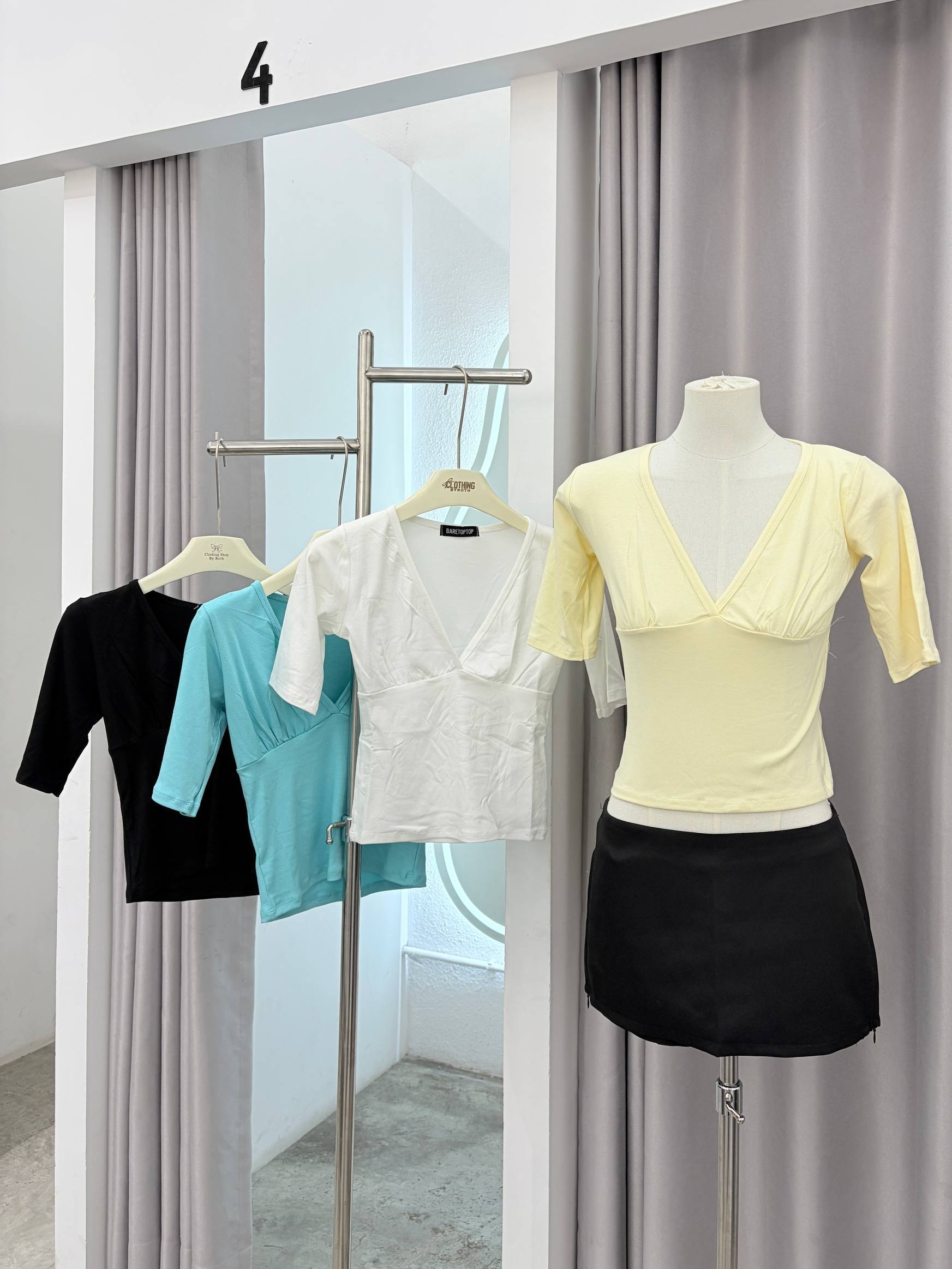 Deep V-neck elbow-sleeve top