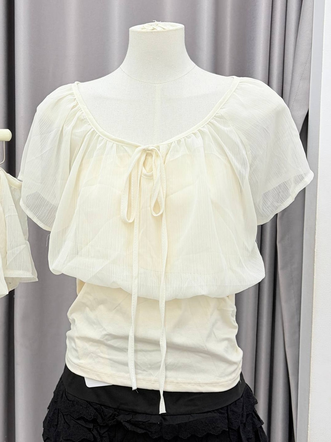 Sheer mesh blouson top