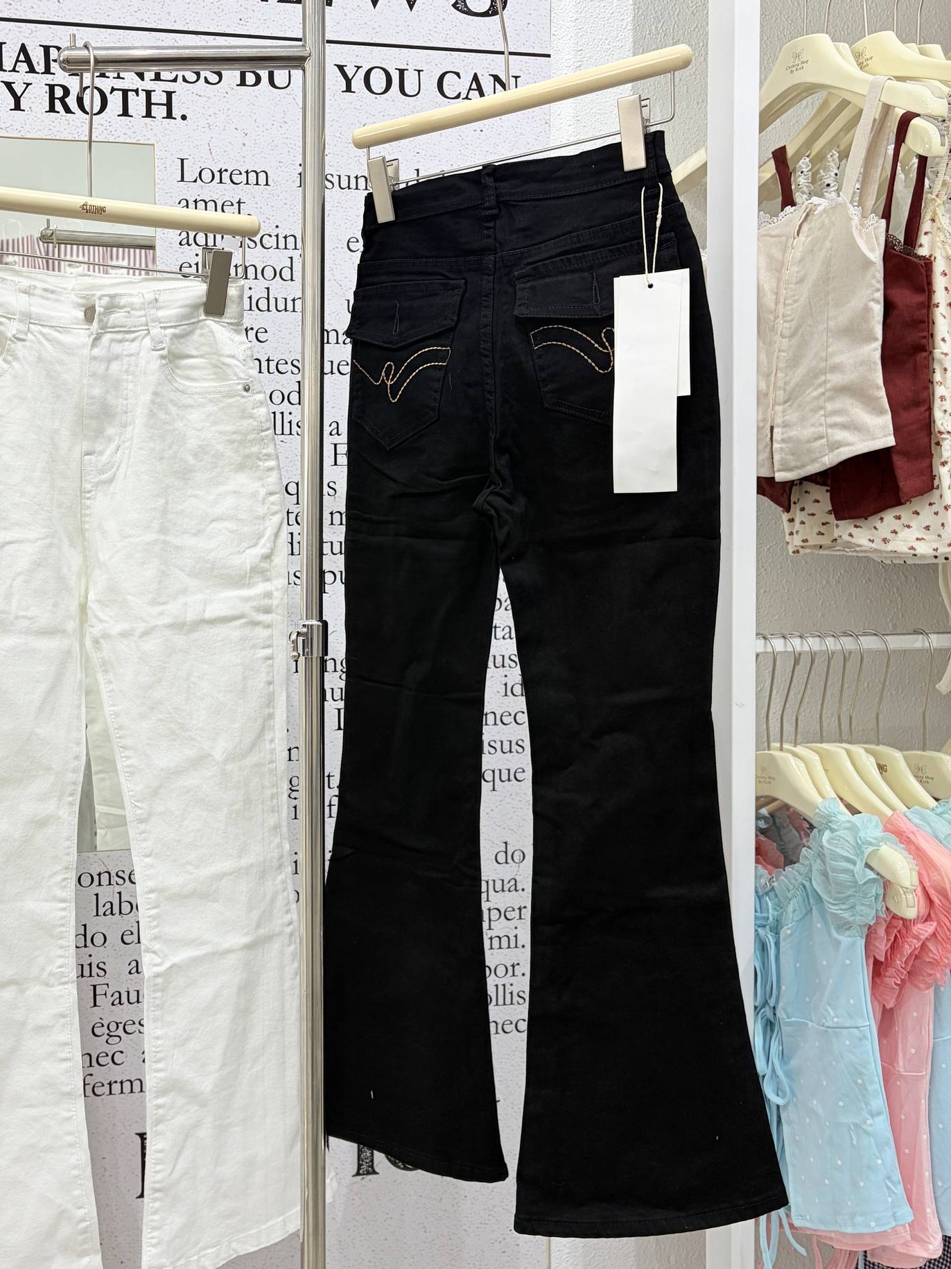 Flap-pocket flare jeans