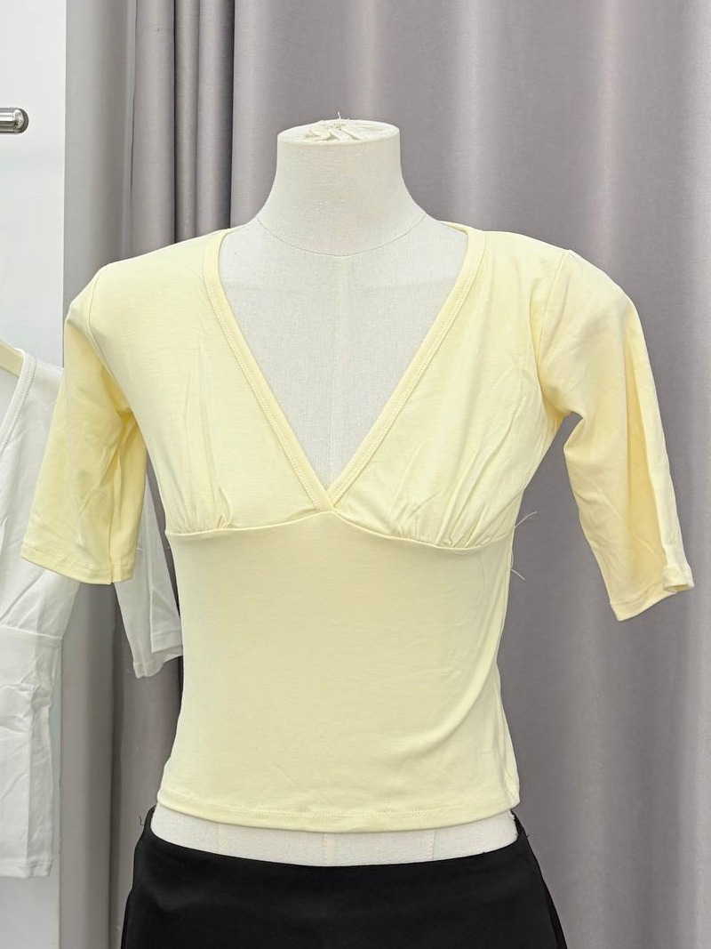 Deep V-neck elbow-sleeve top