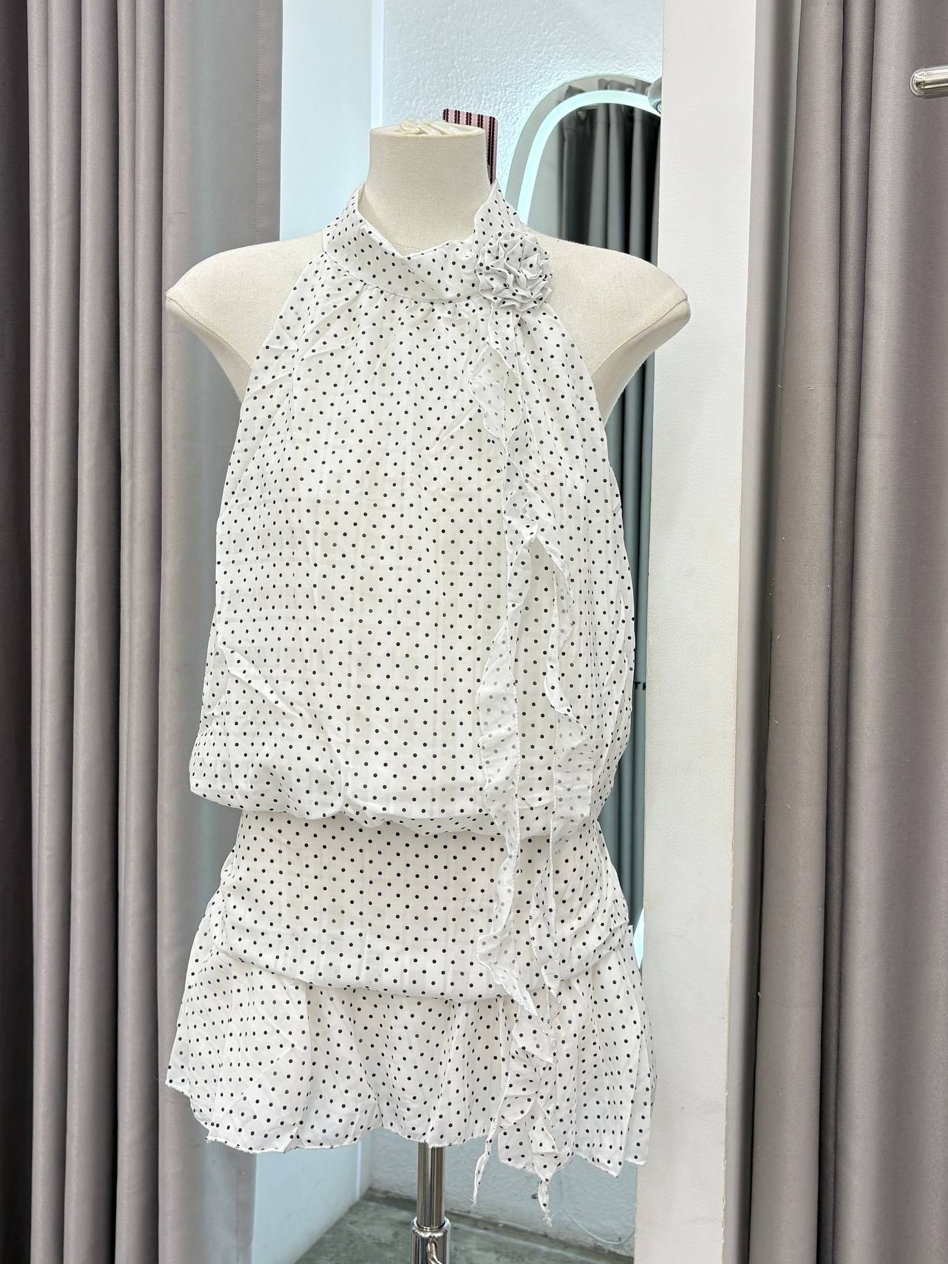 Polka dot halter neck rosette mini dress